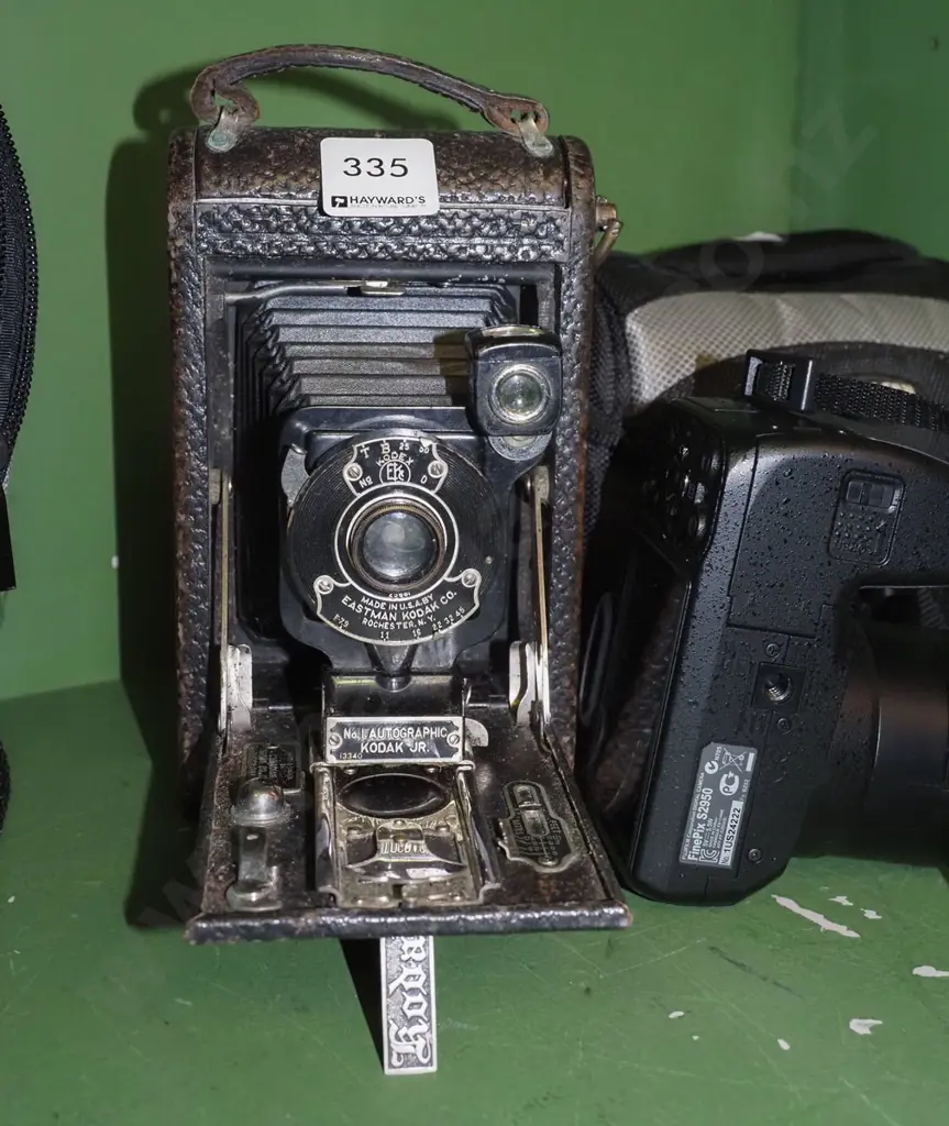 Canon camera bag, concertina camera, Fuji digital camera Image 1++