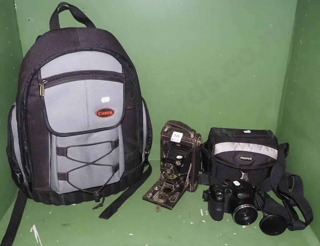 Canon camera bag, concertina camera, Fuji digital camera Image 1++