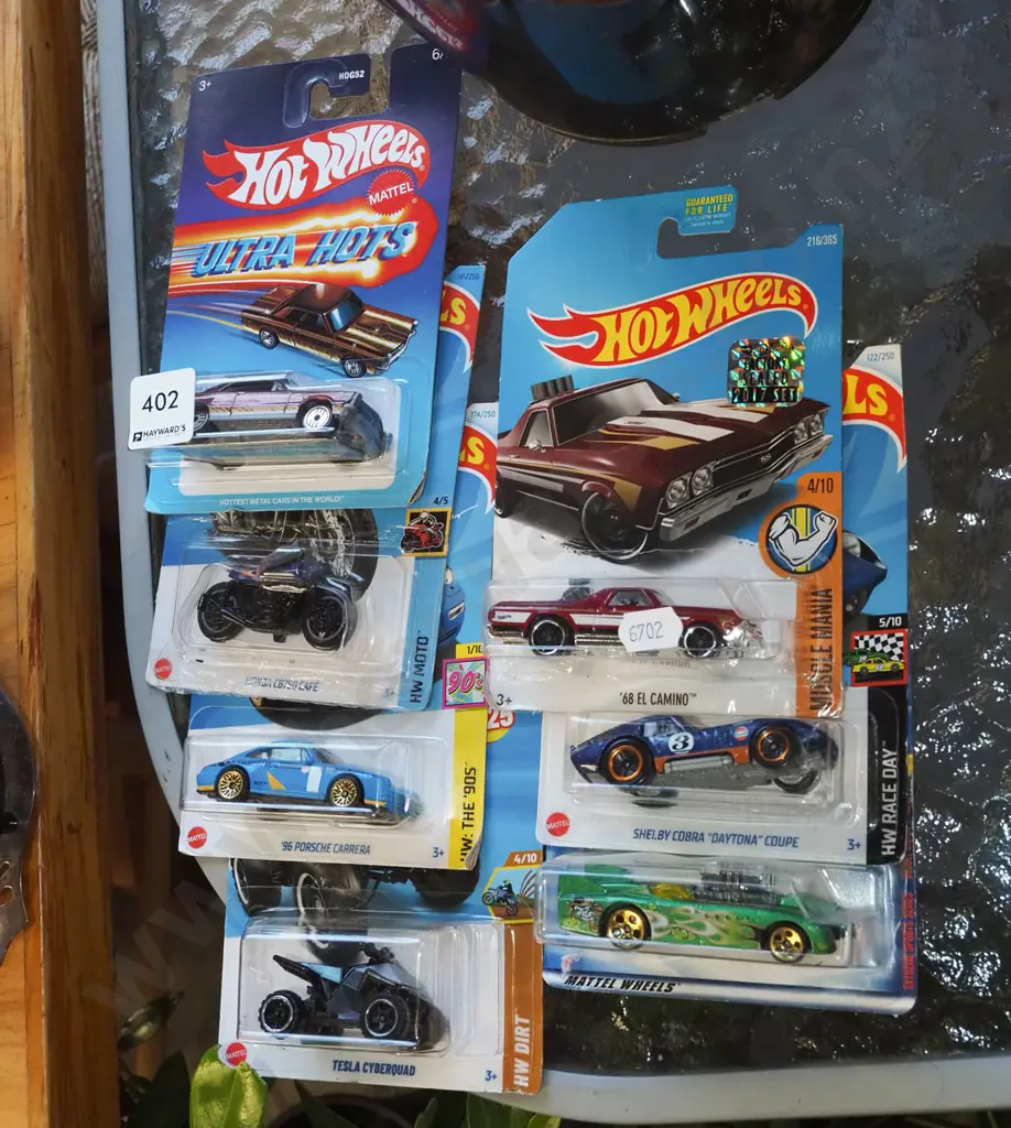 7x carded Hotwheels vehicles Image 1++