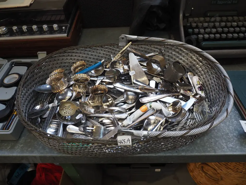 metal basket of cutlery, napkin rings etc Image 1++