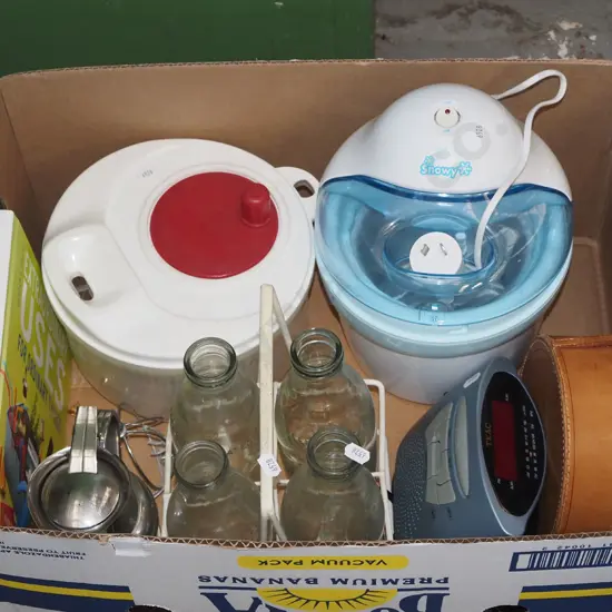 box; radio alarm clock, salad spinner, milk bottles etc
