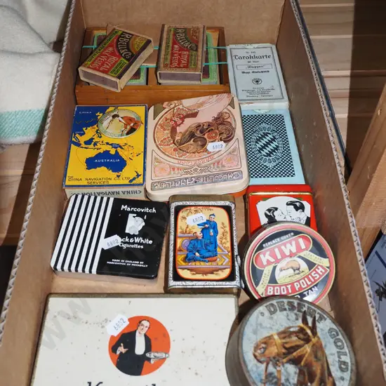box of vintage tins