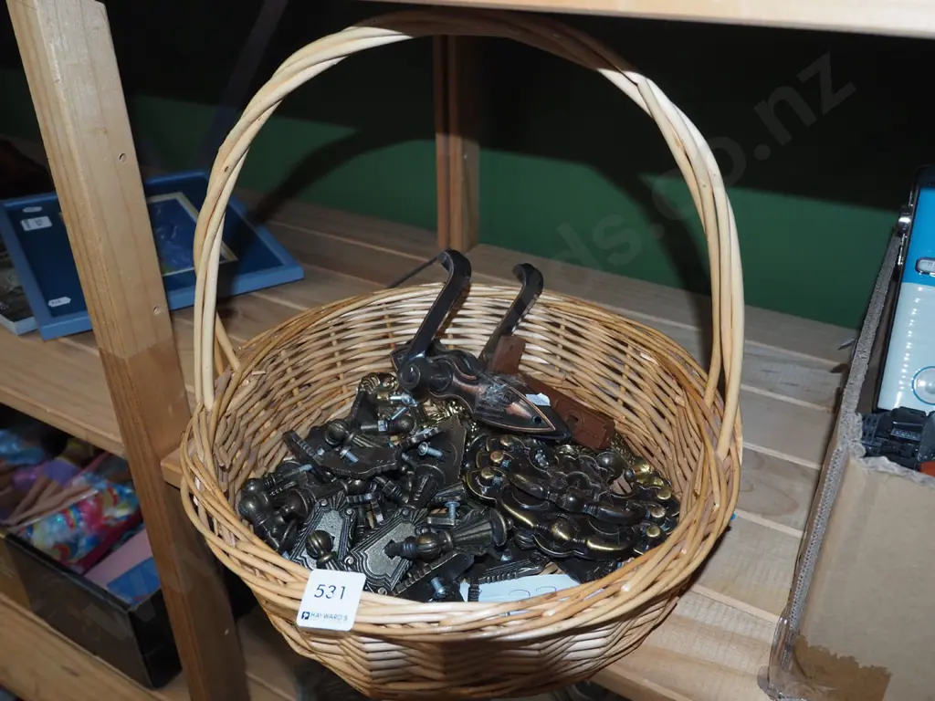 cane basket, numerous cupboard handles Image 1++