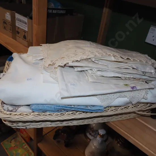 cane basket and hand worked linen