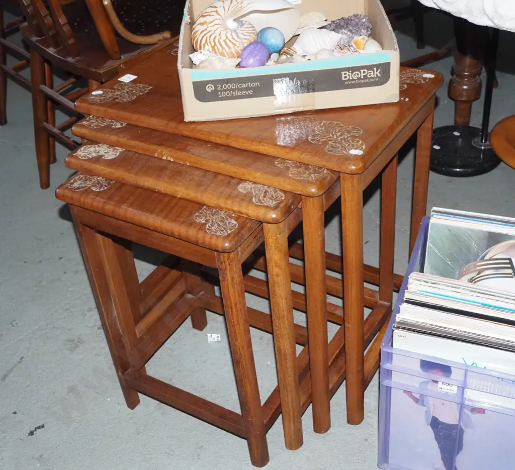 nest of 4 carved mahogany tables Image 1++