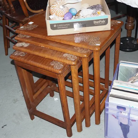 nest of 4 carved mahogany tables