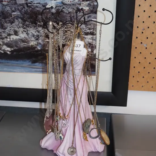 jewellery stand and pendants and necklaces