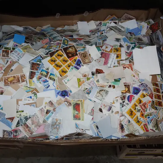 box of loose stamps