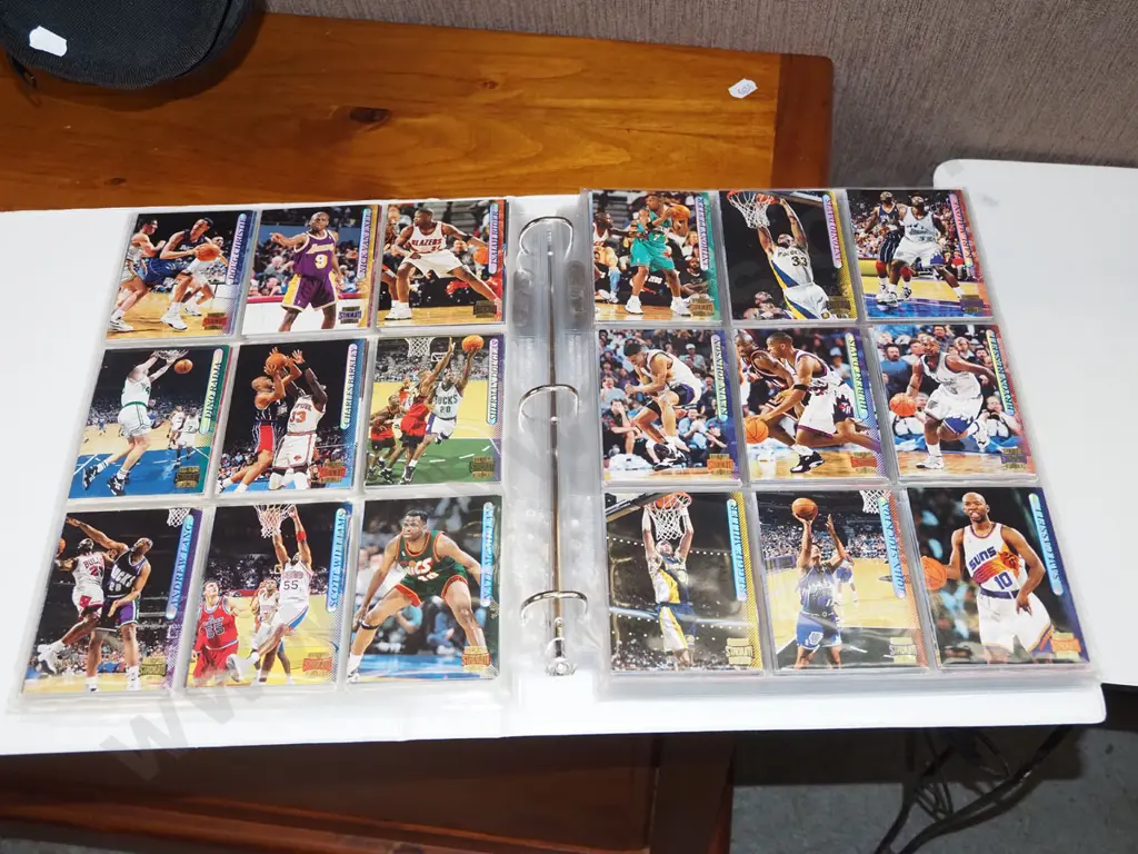 folder of various basketball collector cards Image 1++