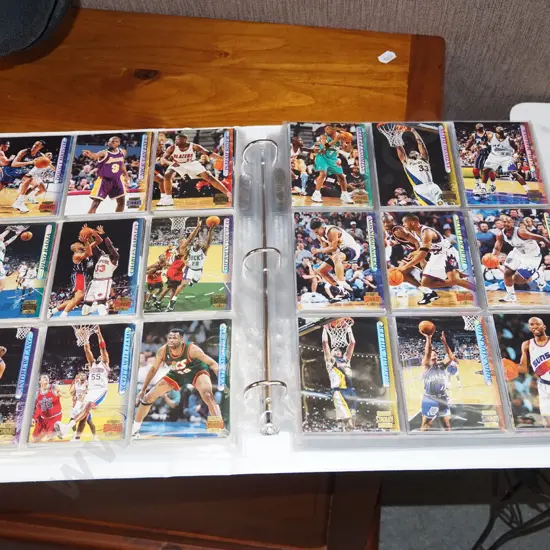 folder of various basketball collector cards