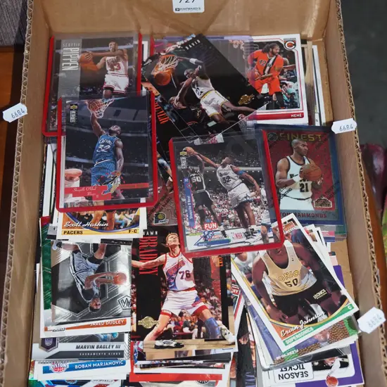 box of basketball collector cards