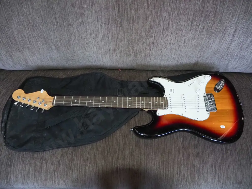 unbranded electric guitar and case Image 1++