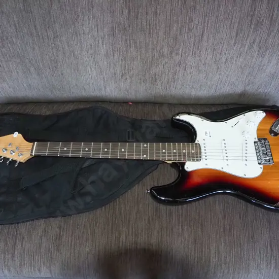 unbranded electric guitar and case
