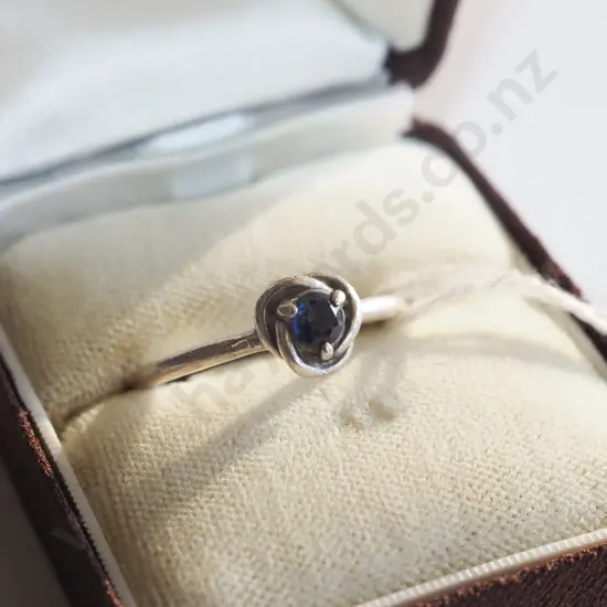 silver ring with blue stone