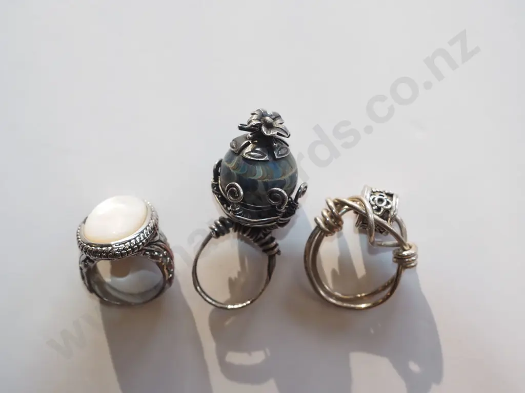 1 x larger copper & mop stone ring & 2 sterling silver worry rings Image 1++