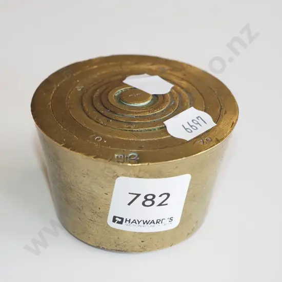 stack of brass nesting weights