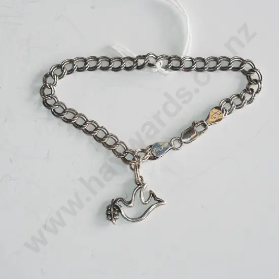 sterling silver link bracelet with bird charm