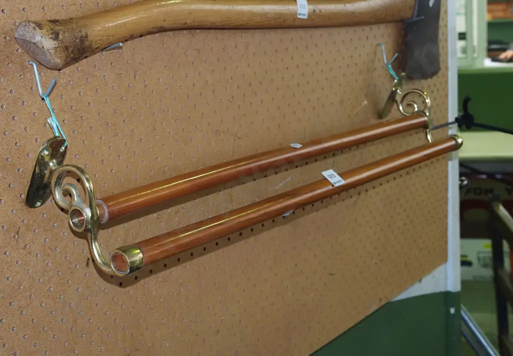 brass and wooden wall mounted towel rail Image 1++