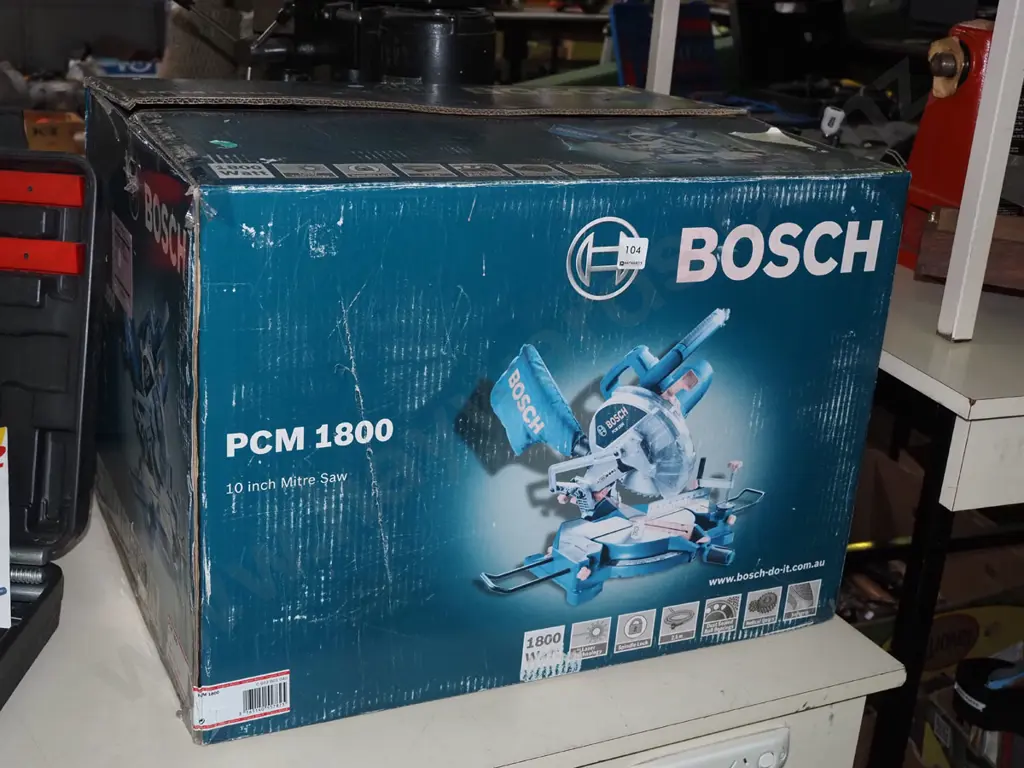 as new boxed Bosch PCM 1800 10" mitre saw Image 1++