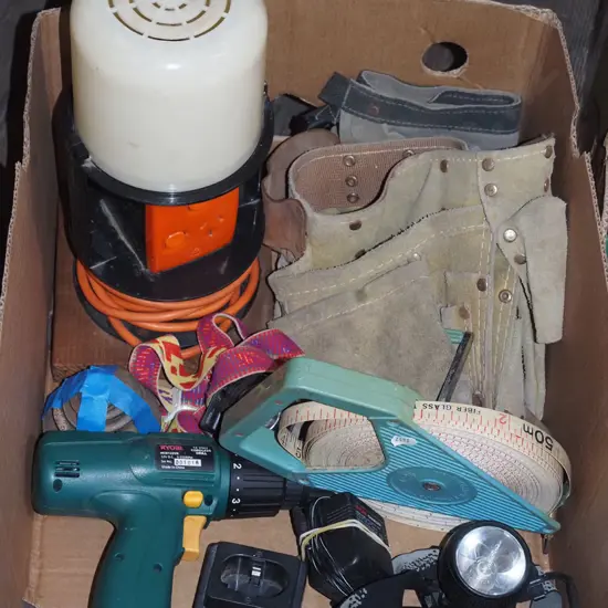 box; builder's belt, tape measure, battery drill etc