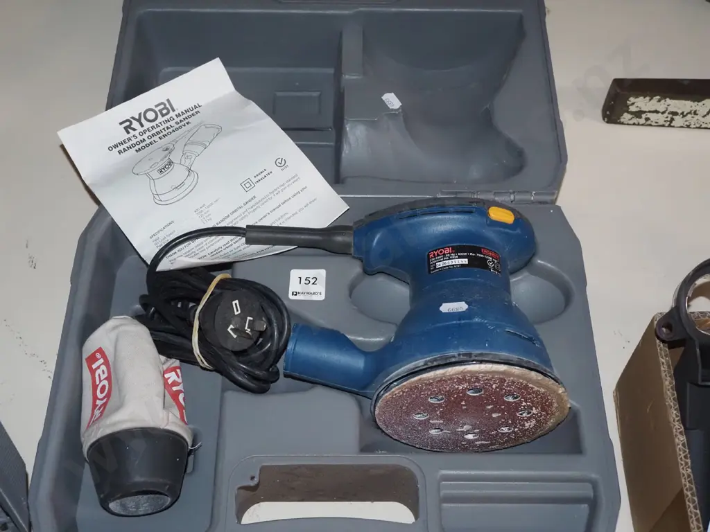 cased Ryobi orbital sander Image 1++