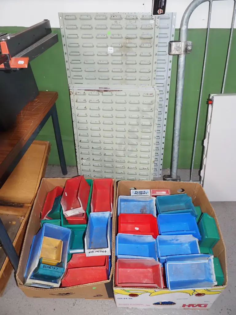 wall mounted louvred storage orgainer with 2x boxes of plastic bins - green dots Image 1++