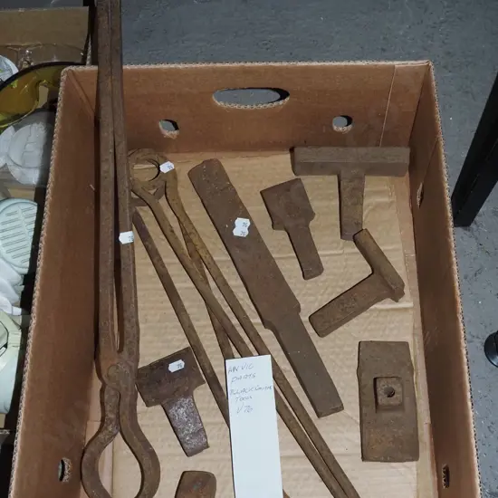 blacksmith's tools and anvil parts