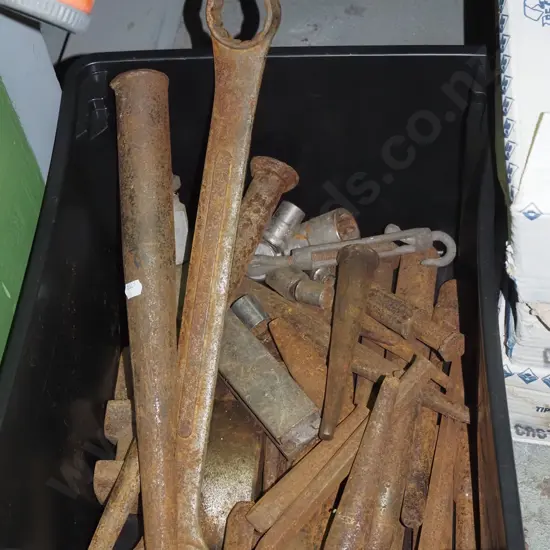 box; various metal spikes, large spanner etc