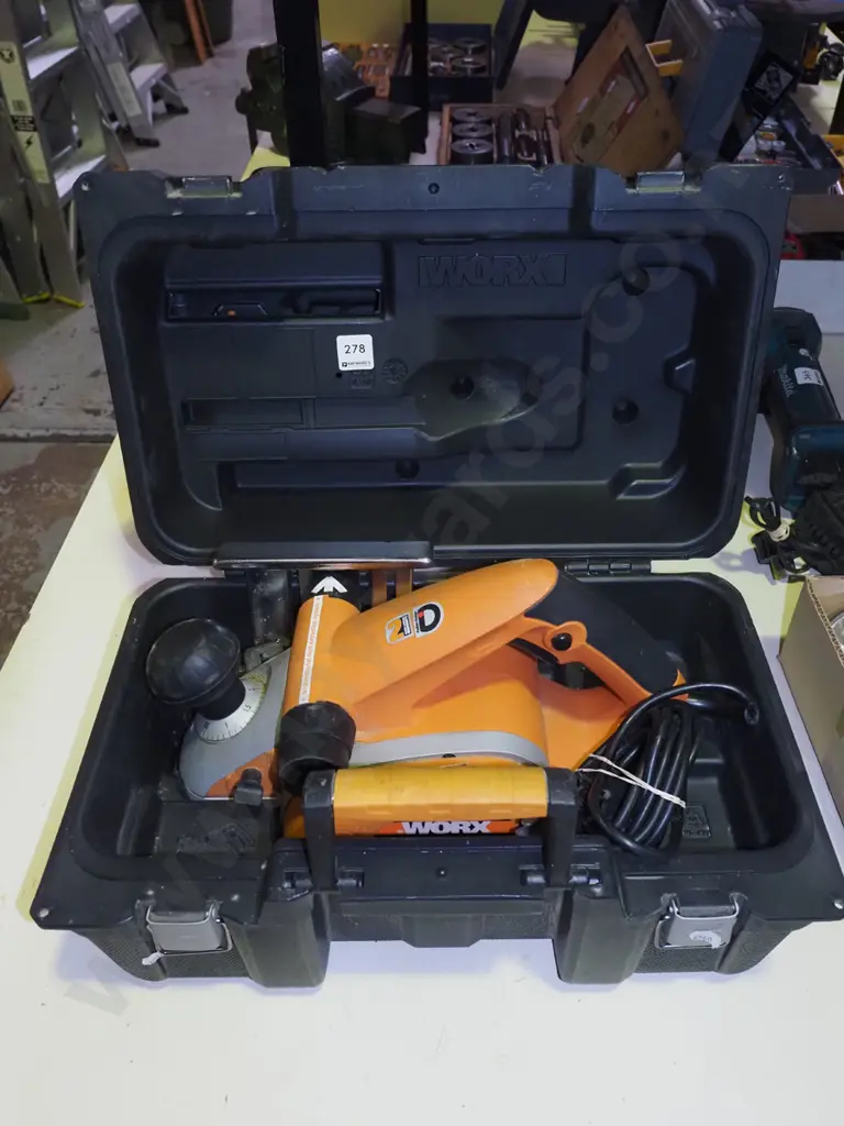 cased Worx electric planer Image 1++