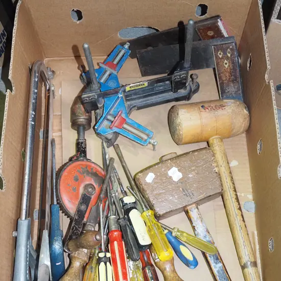 box; mallets, screwdrivers, saws etc