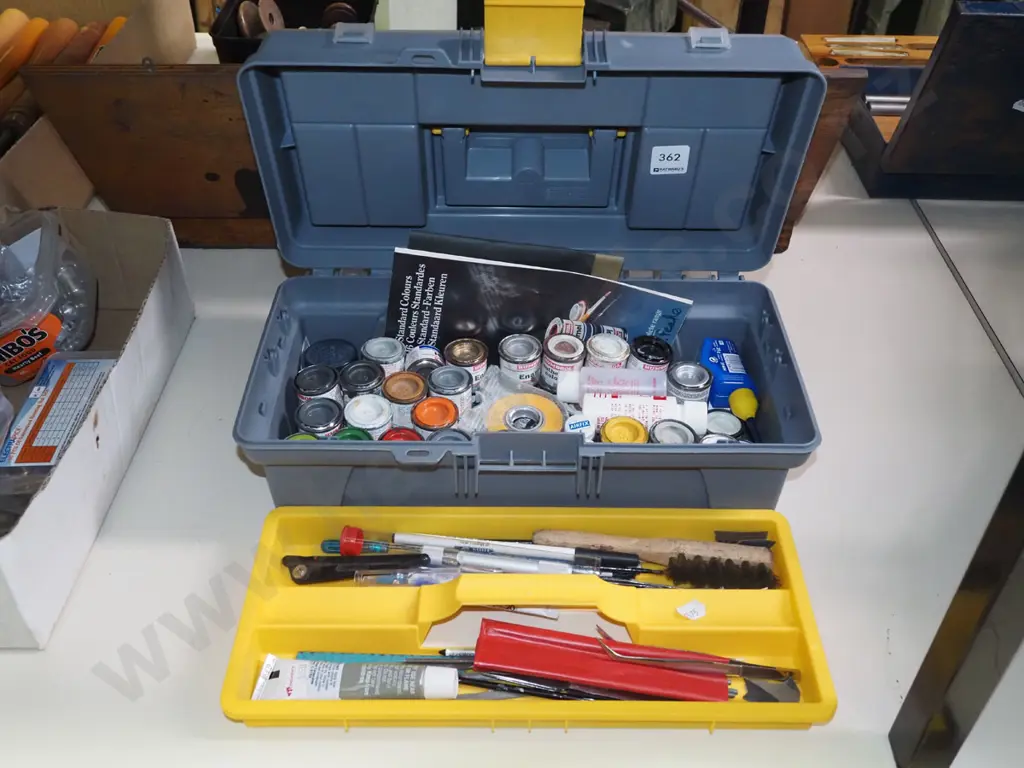 tool box with various modeller's paints and tools Image 1++