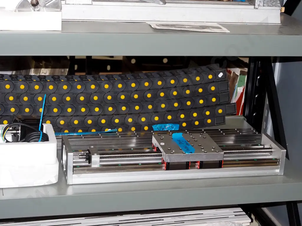 shelf of as new parts to make a CNC machine (Computer Numerical Control)- motors, controllers, tracks, cables etc Image 1++