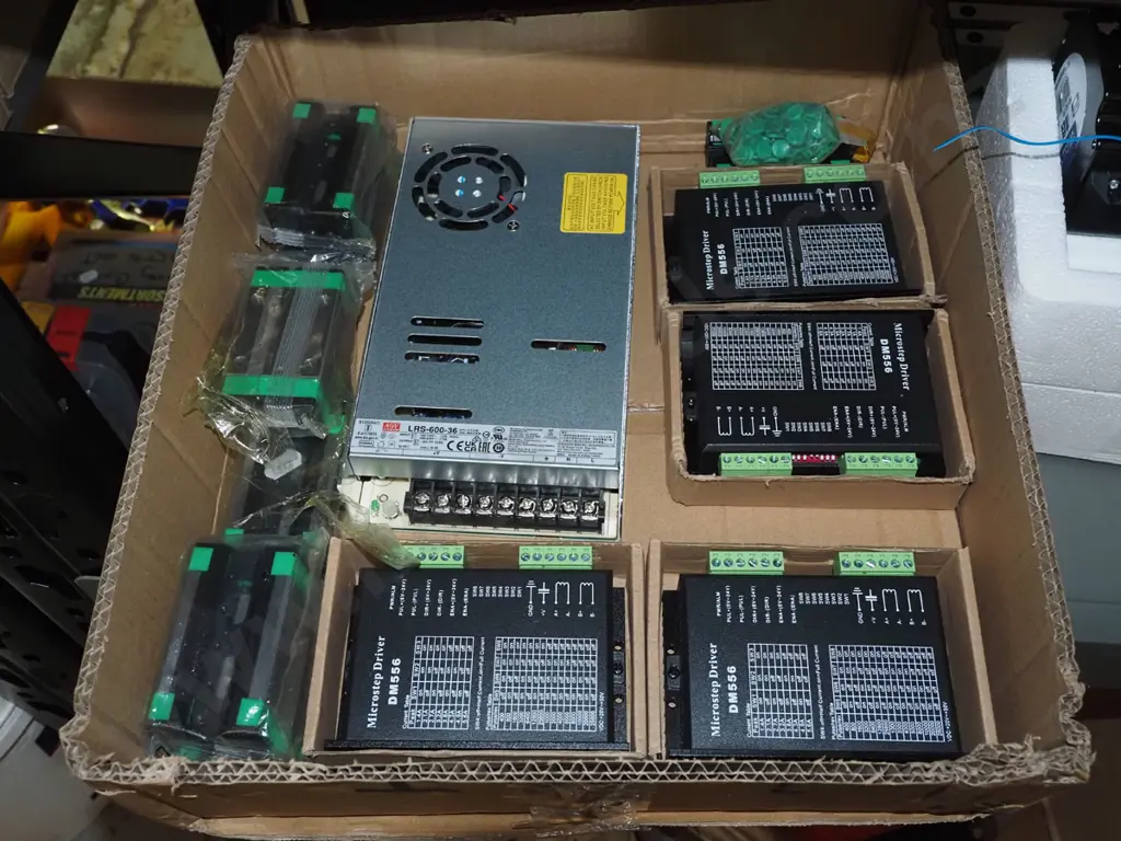 shelf of as new parts to make a CNC machine (Computer Numerical Control)- motors, controllers, tracks, cables etc Image 1++