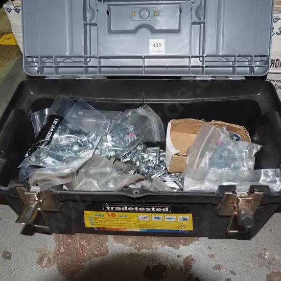 plastic tool box of nuts and bolts