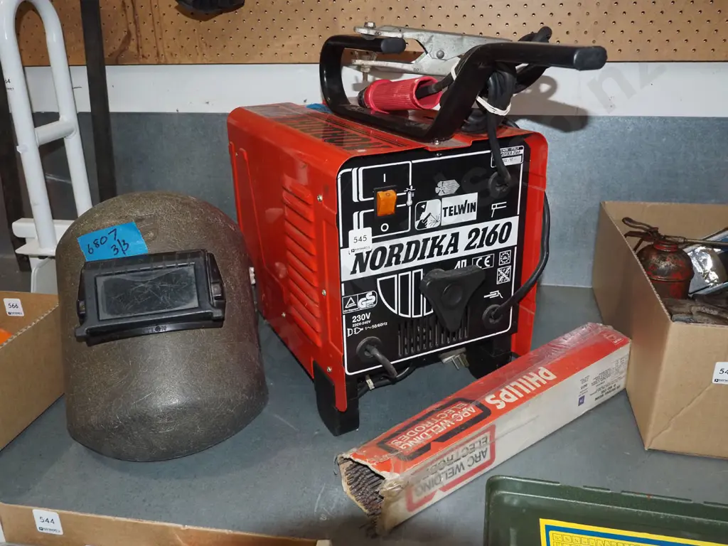Nautika 2160 welder with helmet and welding rods Image 1++