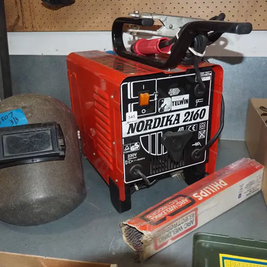 Nautika 2160 welder with helmet and welding rods