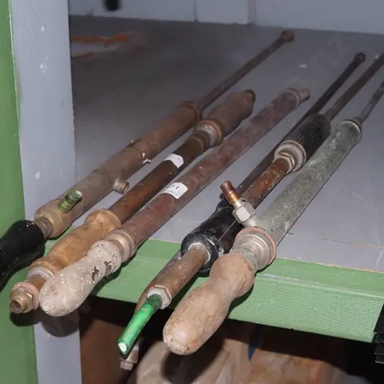 assorted vintage garden spray handled and nozzles