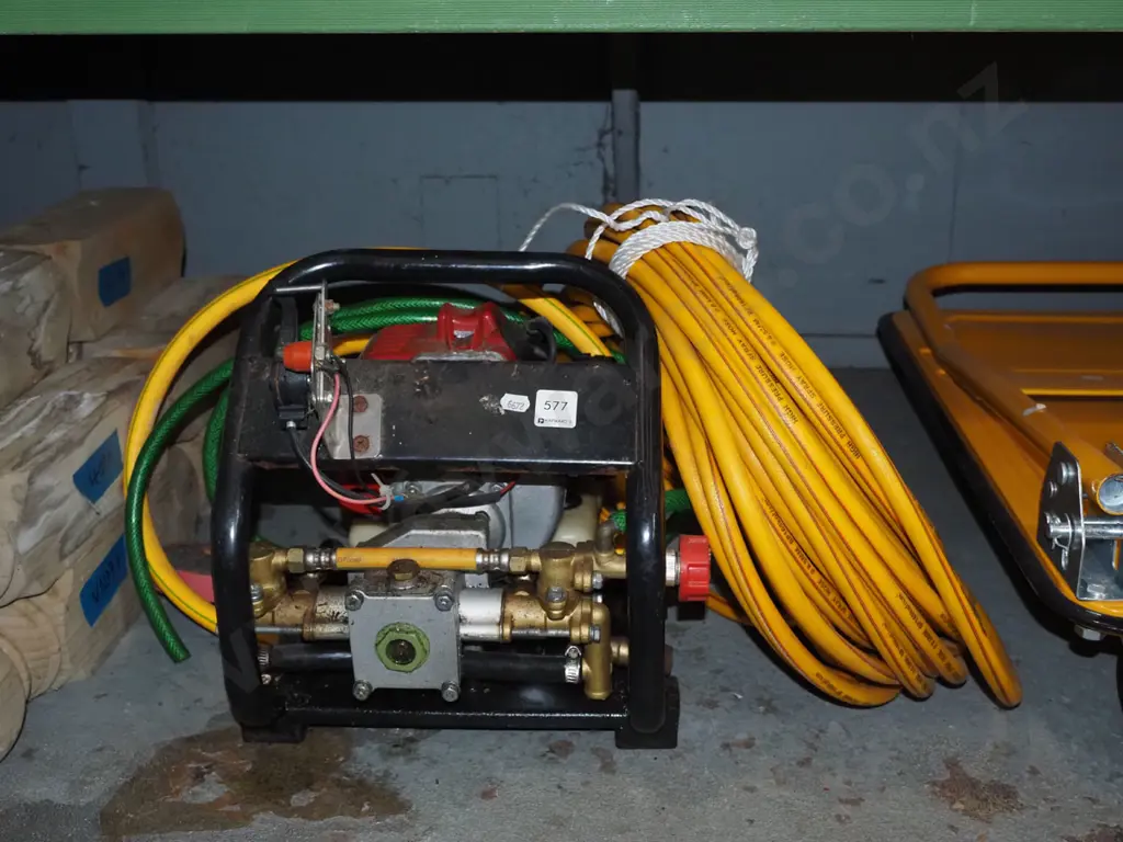 2 stroke water blaster with hose and nozzle Image 1++