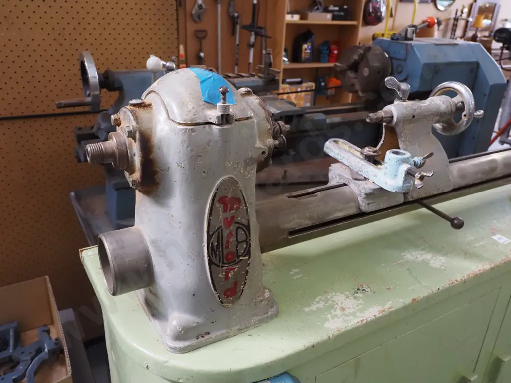 Myford woodworker's lathe on stand and accessories inside stand Image 1++