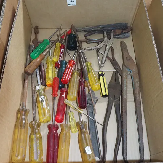 box; tin snips, screwdrivers, pliers etc