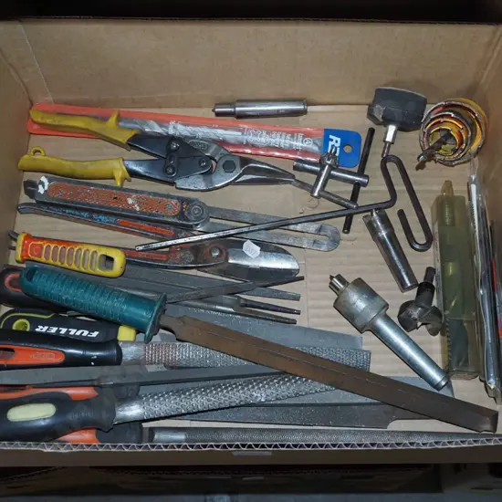 box; tin snips, angle finders, files etc