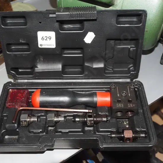 cased manual dual brake flaring tool system