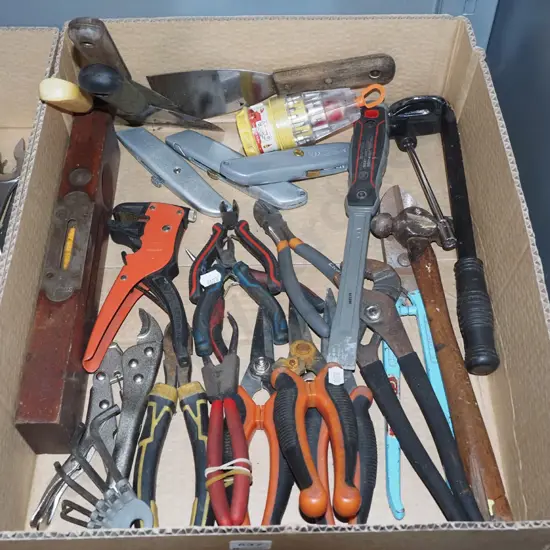 box; pliers, stanley knives, builders level etc