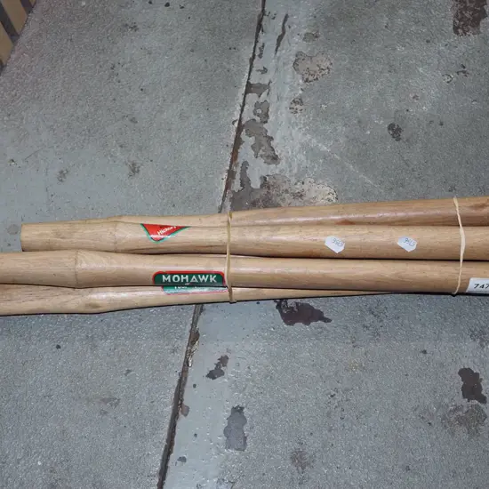 bundle of wooden handles - as new