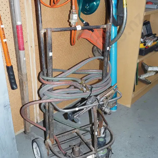 welder's gas bottle stand with torches and valves