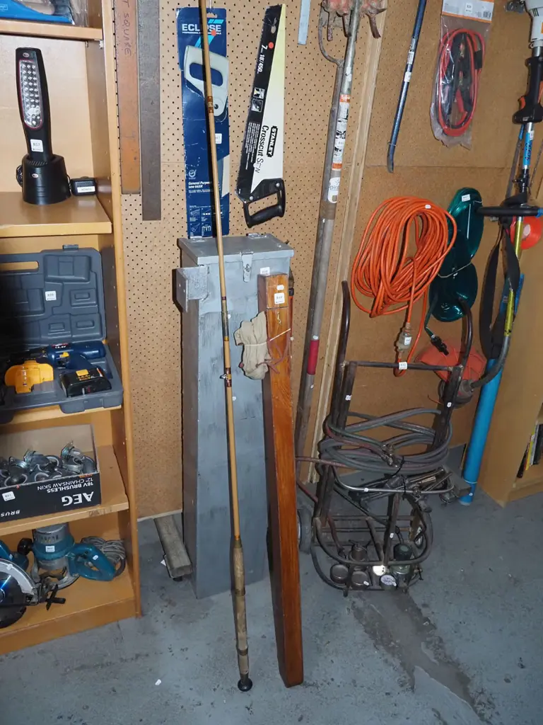 vintage fishing rod with canvas cover and wooden carry box Image 1++