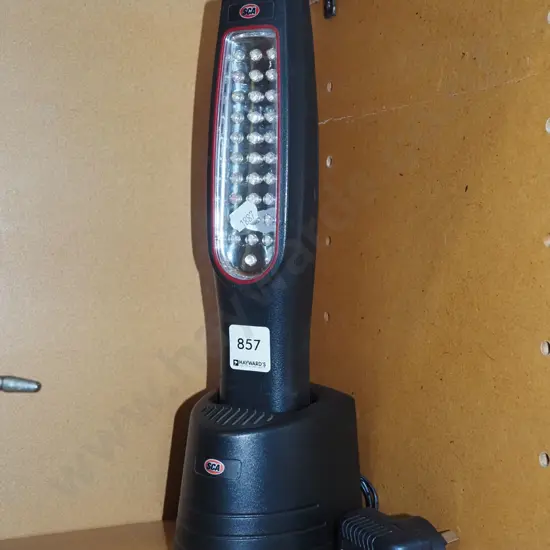 SCA rechargable torch on stand