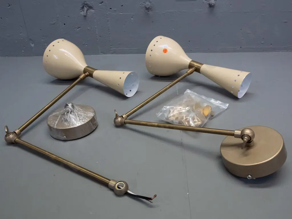 pair of reproduction mid-century style alloy wall-mount bedside lamps with adjustable angle arms, painted pierced shades Image 1++