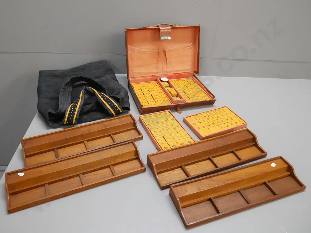 vintage leather-cased Mahjong set with lift-out trays, manufacturer marked on latch and case, plus 4 teak tile trays. Image 1++
