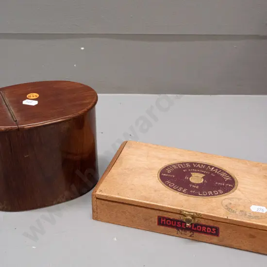 oval rosewood canister with hinged 2/3-lid, lined with green baize, and a cigar box with 1928 customs stamp, and a small